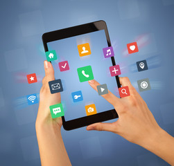 Female hand holding tablet