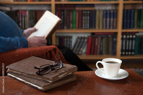 Sweet Moments Of Relaxation With Books And A Cup Of Coffee