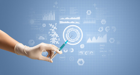 Female doctor holding syringe