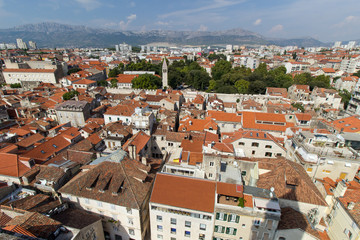 Fototapeta na wymiar Split's historic Old Town and beyond in Croatia viewed from above on a sunny day.