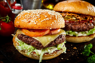 Traditional American cheeseburger on sesame bun