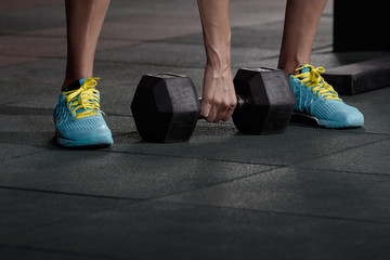 lifting a dumbbell