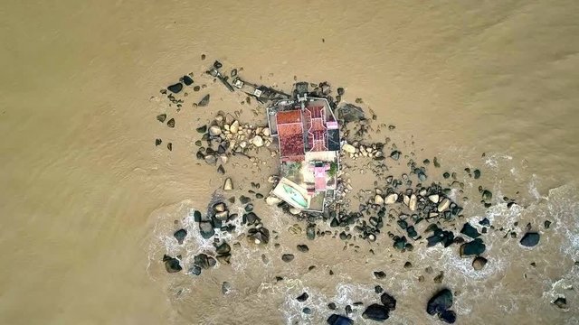 Waves Wash Small Temple on Shallow Sea Island Upper View