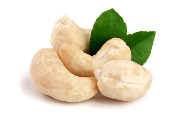 cashew nuts with leaf isolated on white background. macro