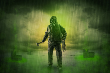 Fototapeta premium Guard in an abandoned space after explosion