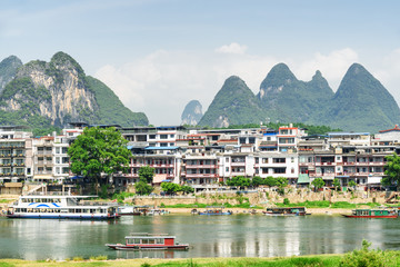 Fototapeta na wymiar Scenic view of tourist boats on the Li River, Yangshuo
