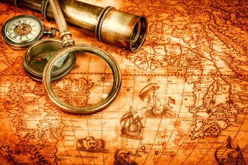 Vintage still life. Vintage items on ancient map.