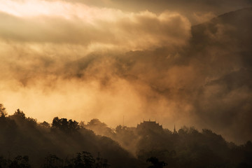 A Temple and pagoda on top of Beautiful mountains landscape.