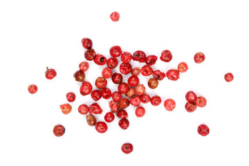 red peppercorns seeds isolated on white background. Top view. Flat lay