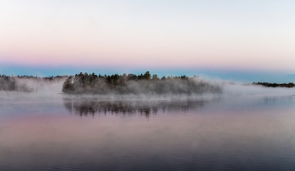 island on a forest lake