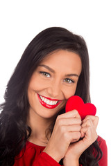 Beautiful female holding red heart, Valentine or Women's day.