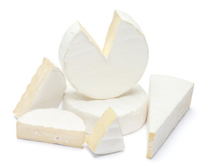 Pile of brie or camambert cheese on a white background