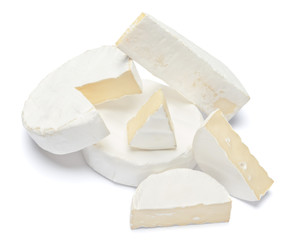 Pile of brie or camambert cheese on a white background
