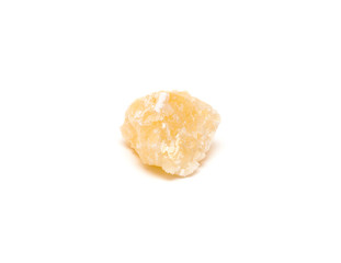 Yellow calcite mineral isolated on white background