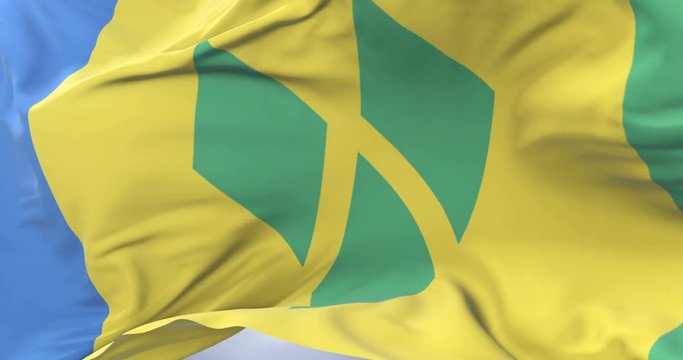 Flag of Saint Vincent and the Grenadines waving at wind in slow, loop