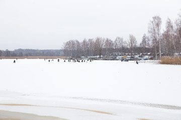 Snow and frozen lake at Riga. Travel photo.