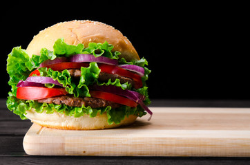 Burger served in bun in nutrition fast food concept