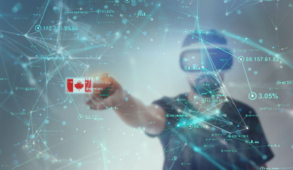 Guy looking through VR (Virtual Reality) glasses - Canadian Flag