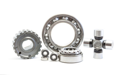 Bearing, rollers and gear parts isolated on white, automotive industry