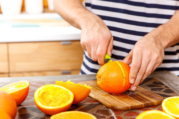 slicing an orange 