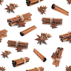 Cinnamon stick group with star anise spice seamless pattern isolated on white background