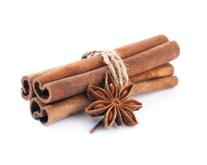 Cinnamon stick group with star anise spice isolated on white background