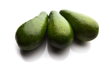 fresh avocados isolated on white
