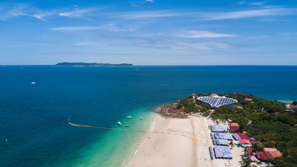 Aerial view of beautiful beach at Koh Larn in Pattaya, Thailand, huge infrastructure of solar cell plant