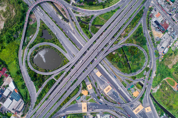 Elevated expressway. The curve of suspension bridge, Thailand. Aerial view. Top view. Background scenic road.