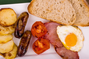 Ulster Fry breakfast with Pan Haggerty or all-day breakfast, a selection of fried breakfast food often served with Sourdough bread and hot fresh coffee.