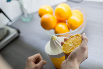 Squeezing Orange Juice by Hand