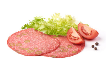 Traditional slices salami smoked sausage, combined with green olive, isolated on white background.