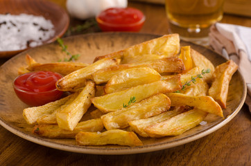 Homemade french fries with organic ketchup