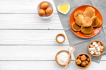 Ingredients for cook american pancakes on white wooden background top view copy space