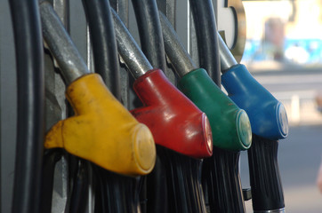 Fuel pistols close up at the gas station