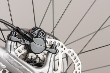Fototapeta premium Hydraulic rear disc brake of mountain bike, close up view