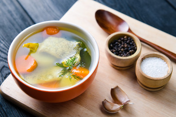 Fish soup served on the table in plate
