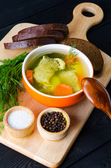 Fish soup served on the table in plate