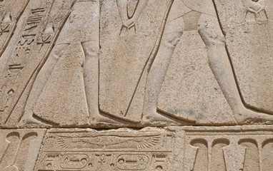 The reliefs of Egyptian hieroglyphs on the wall in Karnak temple,Luxor,Egypt