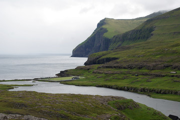 Fototapeta na wymiar Green Fjords on Faroe Islands