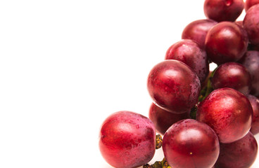 Fresh red grapes isolated on white background