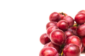 Fresh red grapes isolated on white background