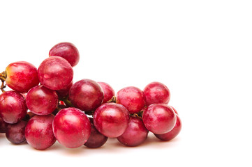 Fresh red grapes isolated on white background