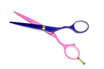 Professional colored haircut scissors isolated on white background, blue and pink