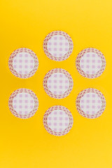 Cardboard cupcakes boxes on retro colour background