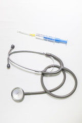 Medical essential - syringe and stethoscope