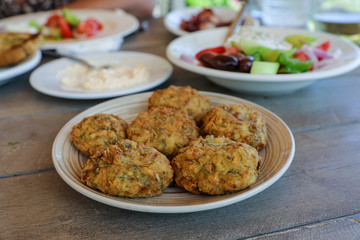 Fried zucchini balls plate in the greek tavern.