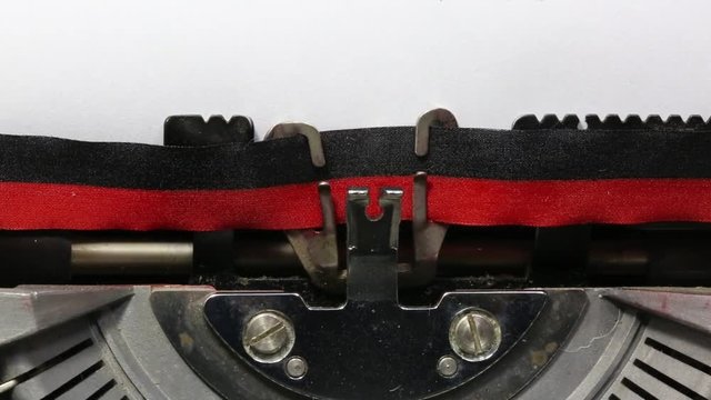words I Love You flows on the sheets of an old typewriter