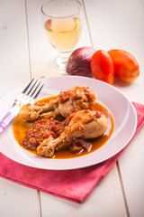 chicken leg with tomato sauce, selective focus