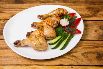 chicken legs on the grill